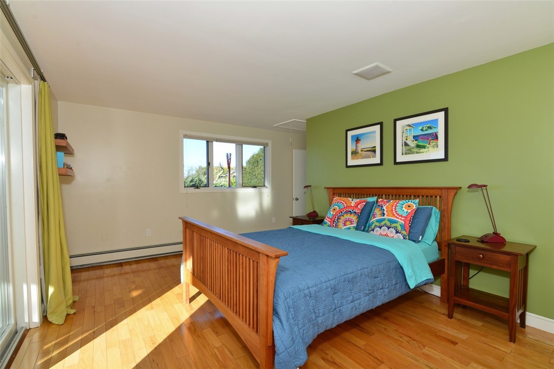 55 West Main Road Little Compton, RI 02837 - Photo 18 of 35 Primary bedroom with access to deck