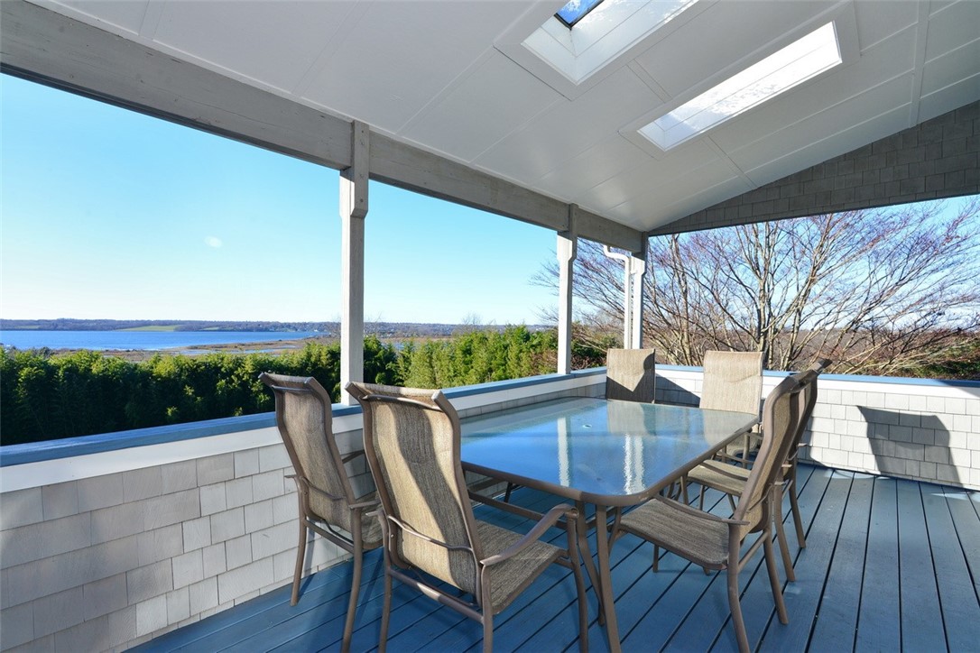 55 West Main Road Little Compton, RI 02837 - Photo 20 of 35 Access from primary bedroom to covered portion of deck