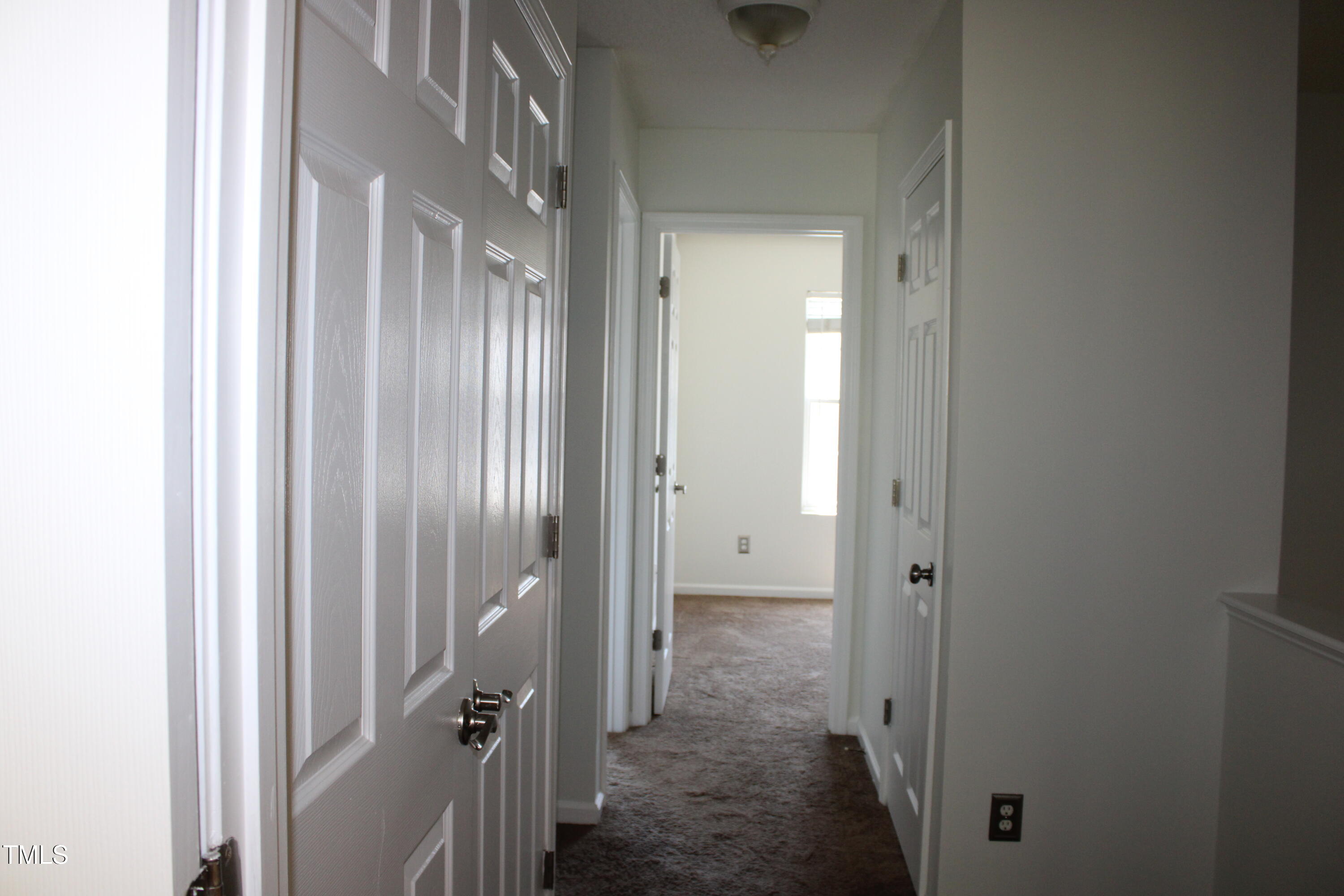 2802 Gross Avenue Wake Forest, NC 27587 - Photo 14 of 20 a view of a bathroom from a hallway