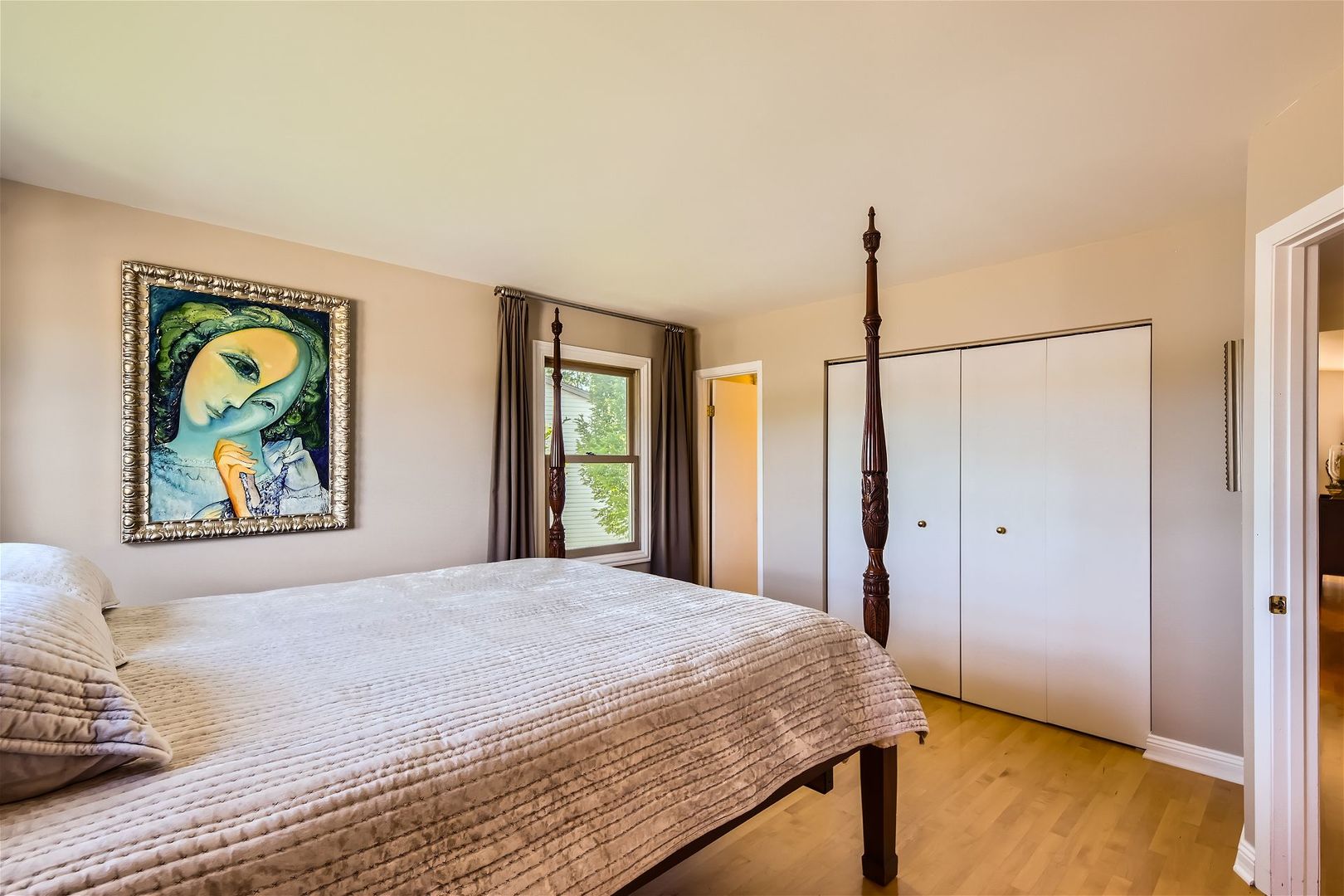 1365 Freeman Road Hoffman Estates, IL 60192 - Photo 14 of 49 a bedroom with a bed and a window