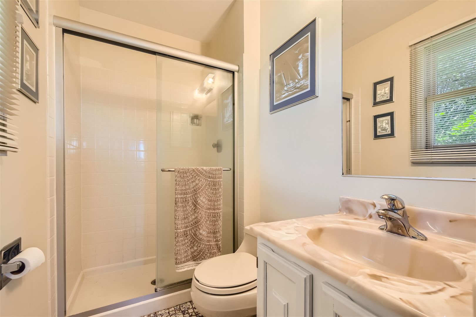 1365 Freeman Road Hoffman Estates, IL 60192 - Photo 15 of 49 a bathroom with a sink toilet and shower