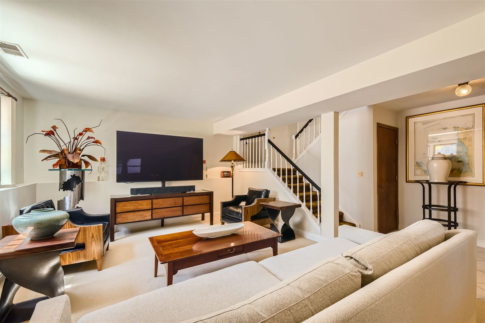 1365 Freeman Road Hoffman Estates, IL 60192 - Photo 20 of 49 a living room with furniture and a flat screen tv