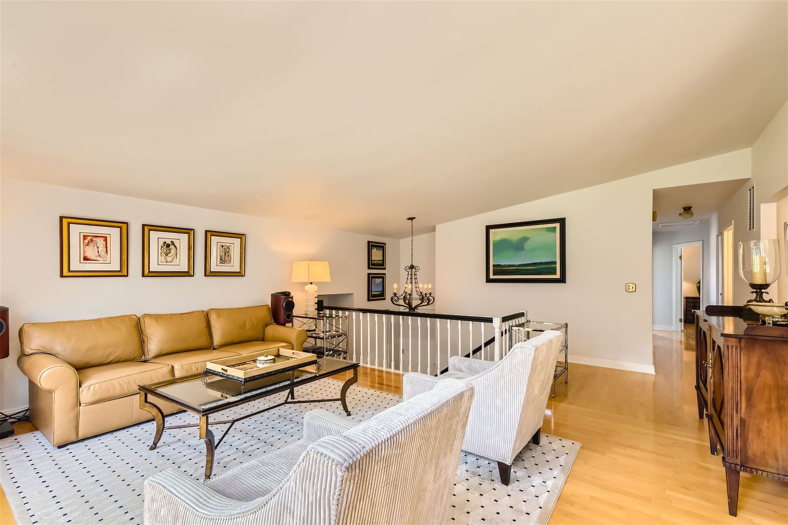 1365 Freeman Road Hoffman Estates, IL 60192 - Photo 2 of 49 a living room with furniture and a wooden floor