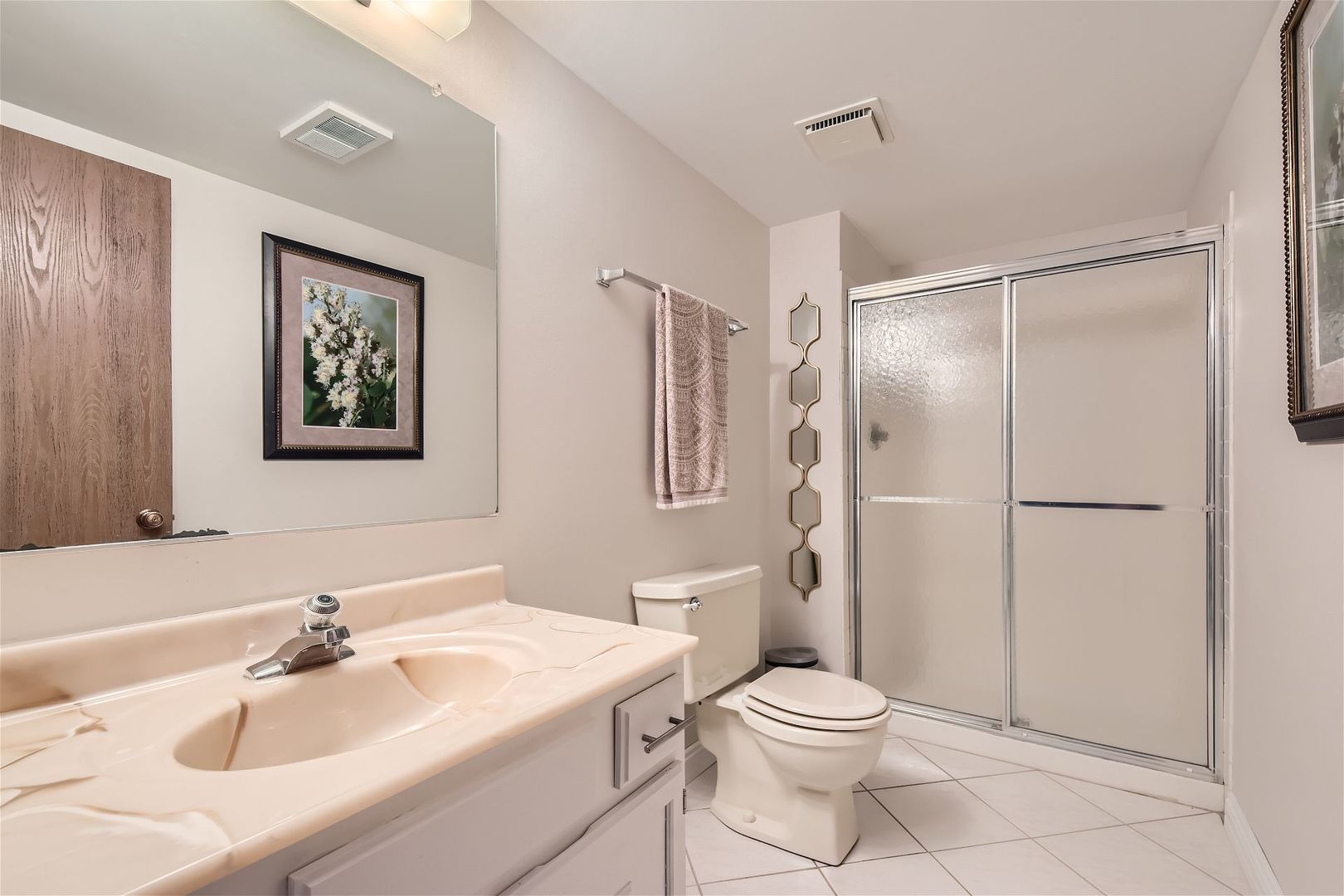 1365 Freeman Road Hoffman Estates, IL 60192 - Photo 28 of 49 a bathroom with a sink toilet and shower