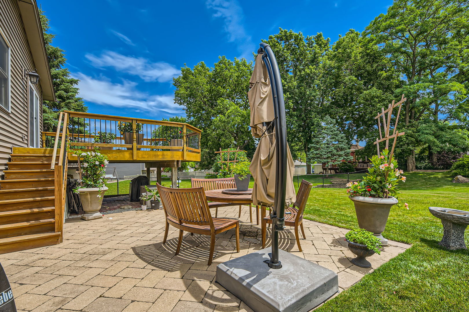 1365 Freeman Road Hoffman Estates, IL 60192 - Photo 32 of 49 a view of a backyard with sitting area