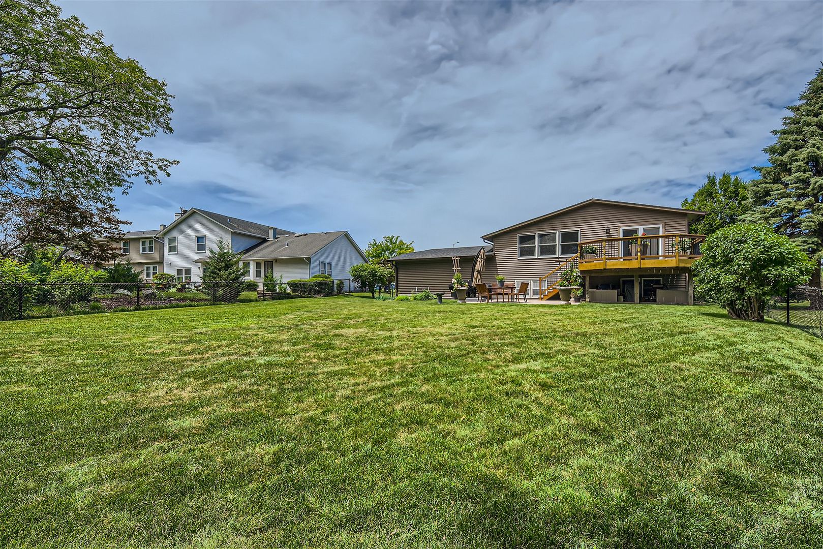 1365 Freeman Road Hoffman Estates, IL 60192 - Photo 35 of 49 a front view of a house with a yard