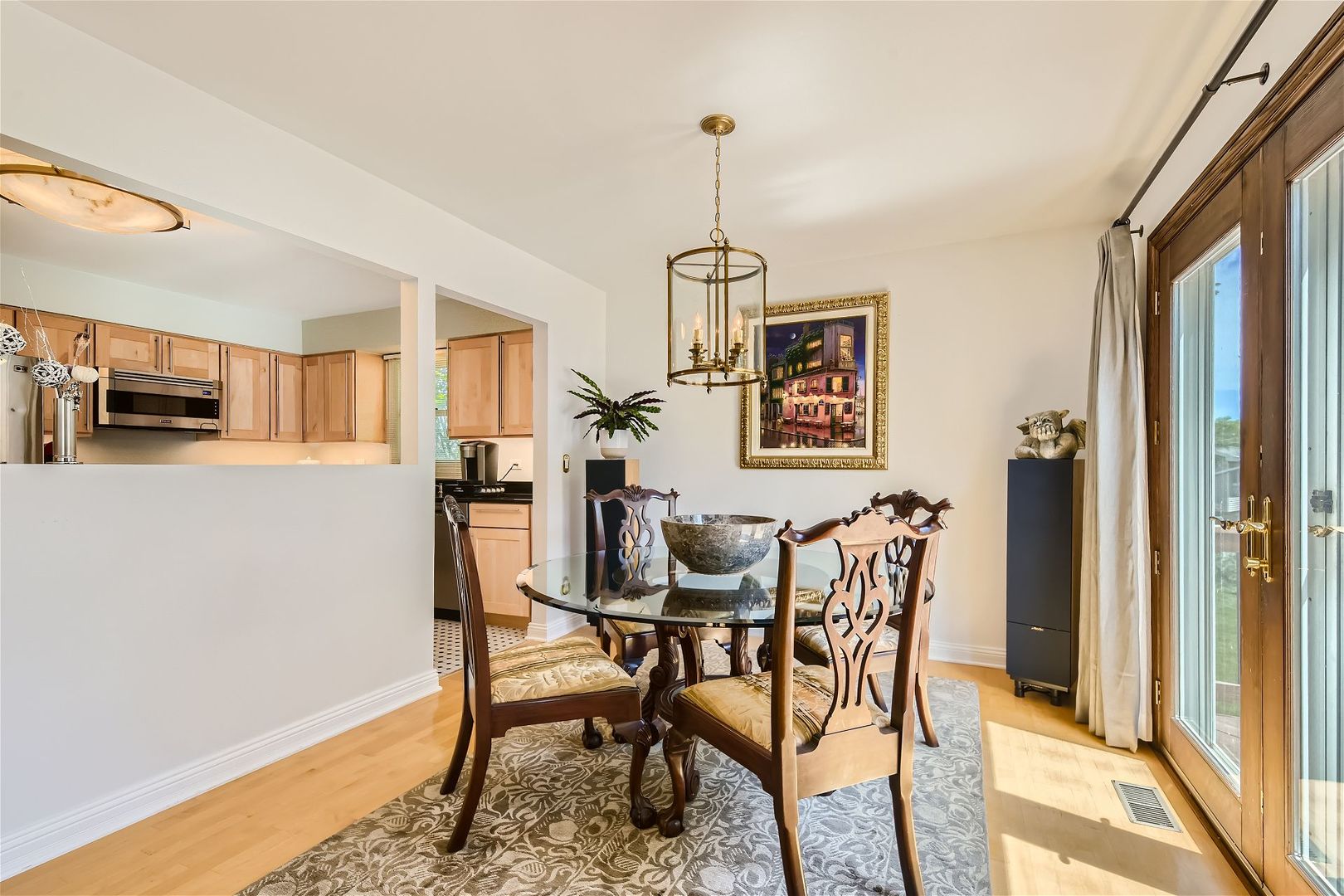 1365 Freeman Road Hoffman Estates, IL 60192 - Photo 7 of 49 a view of a dining room with furniture window and wooden floor