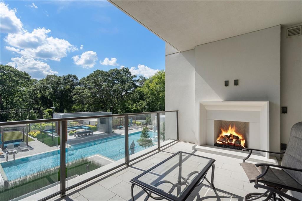2520 Peachtree Road Northwest, Unit 403 Atlanta, GA 30305 - Photo 21 of 52 a view of a balcony with furniture