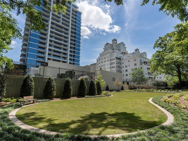 2520 Peachtree Road Northwest, Unit 403 Atlanta, GA 30305 - Photo 41 of 52 a view of a swimming pool with a yard