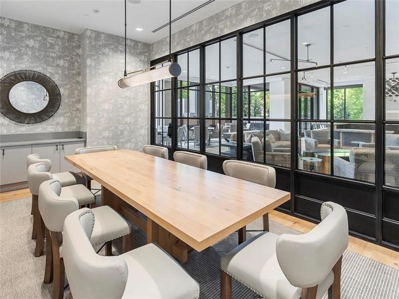 2520 Peachtree Road Northwest, Unit 403 Atlanta, GA 30305 - Photo 44 of 52 a dining room with furniture and a floor to ceiling window