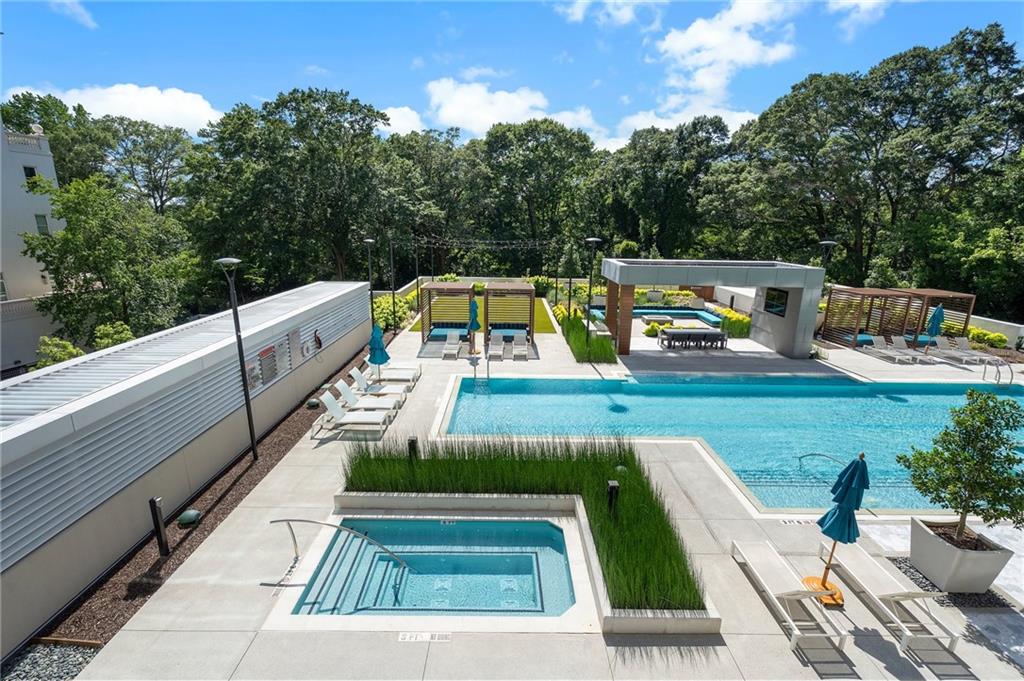 2520 Peachtree Road Northwest, Unit 403 Atlanta, GA 30305 - Photo 50 of 52 a view of a swimming pool with a patio
