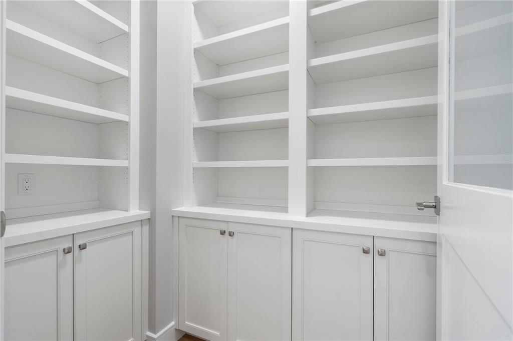 2520 Peachtree Road Northwest, Unit 403 Atlanta, GA 30305 - Photo 10 of 52 a view of walk in closet with empty racks
