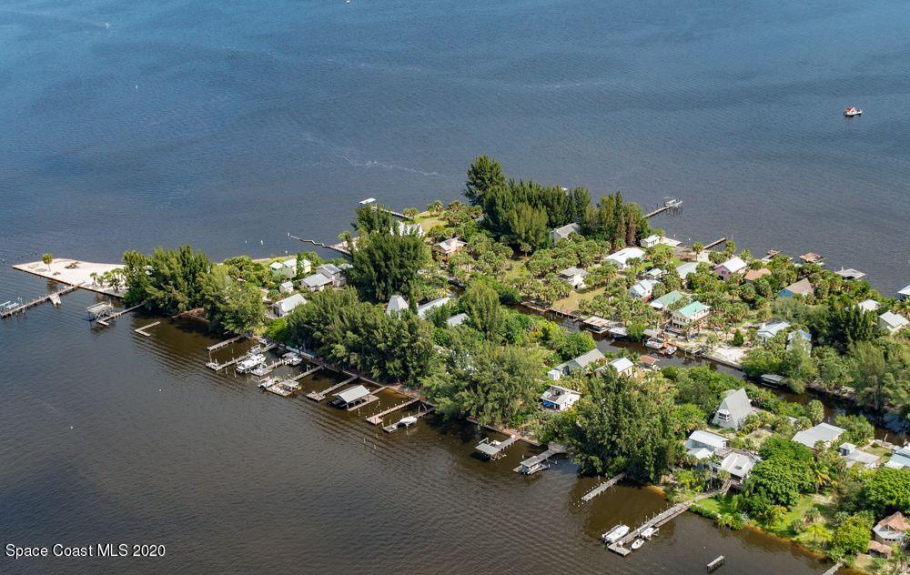 48 Vip Island, Unit B Grant, FL 32949 - Photo 4 of 9 a bunch of flowers with a garden