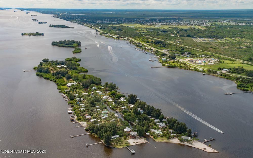 48 Vip Island, Unit B Grant, FL 32949 - Photo 9 of 9 view of a lake with a mountain in the background