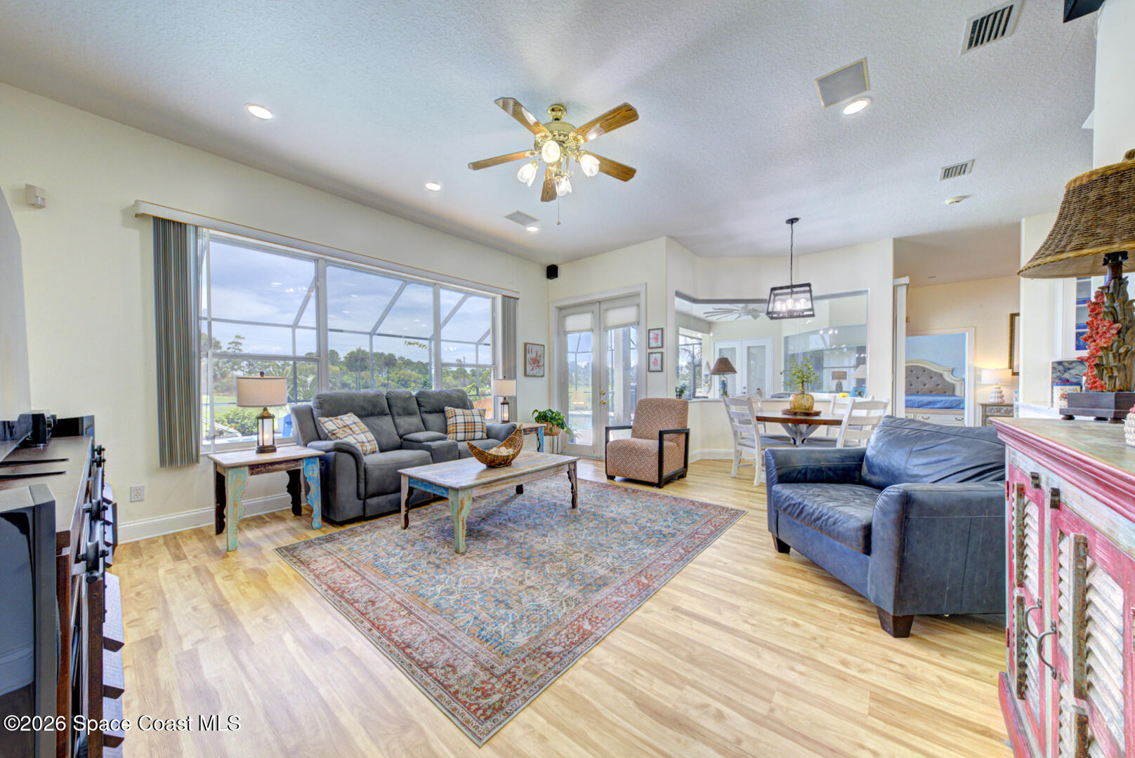 4056 Sand Ridge Drive Merritt Island, FL 32953 - Photo 49 of 69 family room with pool view