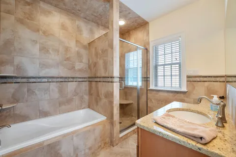 a bathroom with a sink and a bathtub