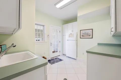 a bathroom with a sink and a shower