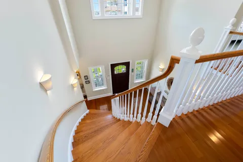 a view of entryway with wooden floor