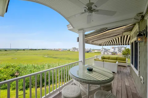 a view of a water pond with lots of green space