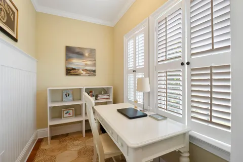 a kitchen with a stove a sink and a refrigerator