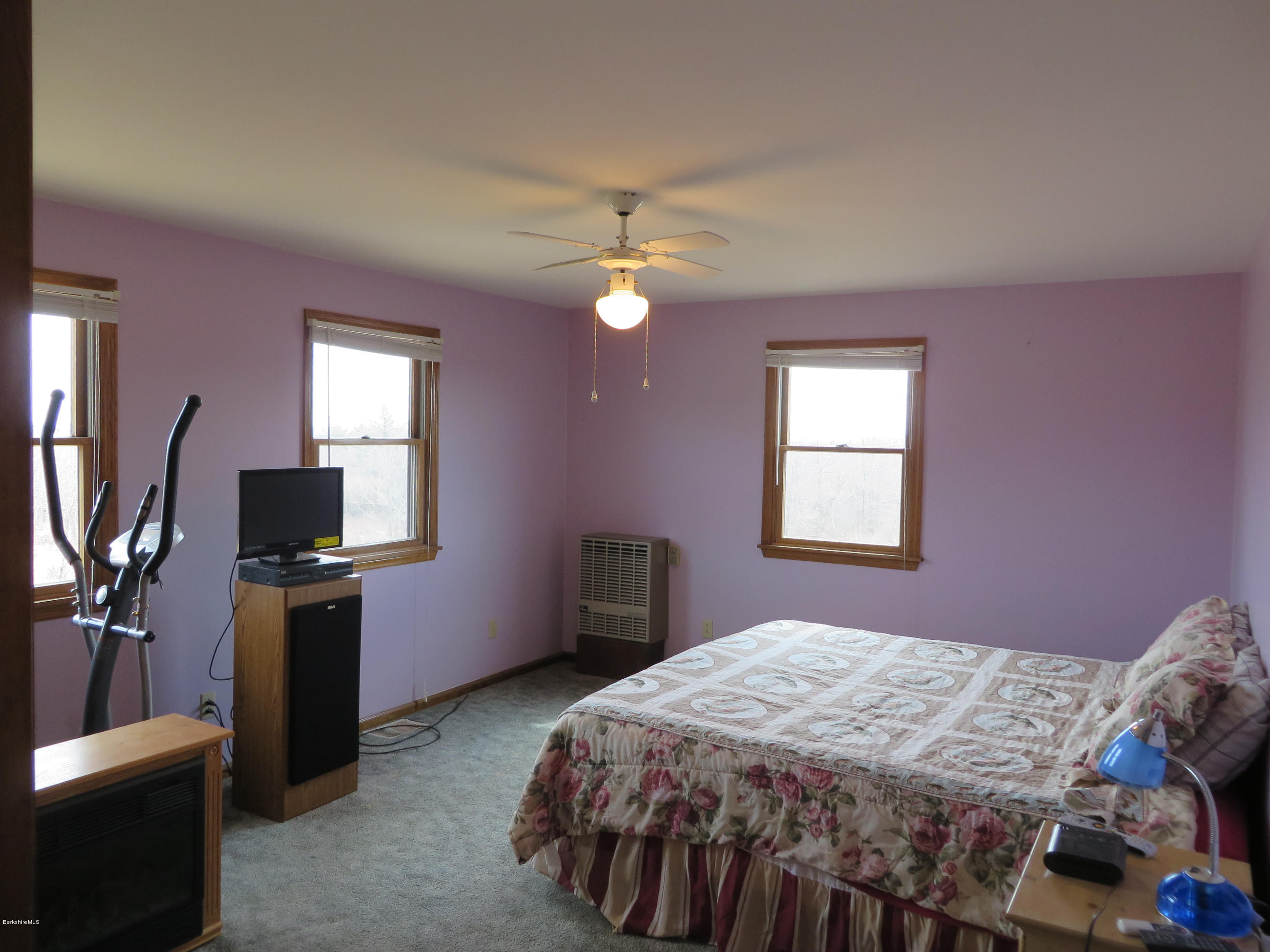 29 S Road Peru, MA 01235 - Photo 9 of 25 a bedroom with a bed and a television