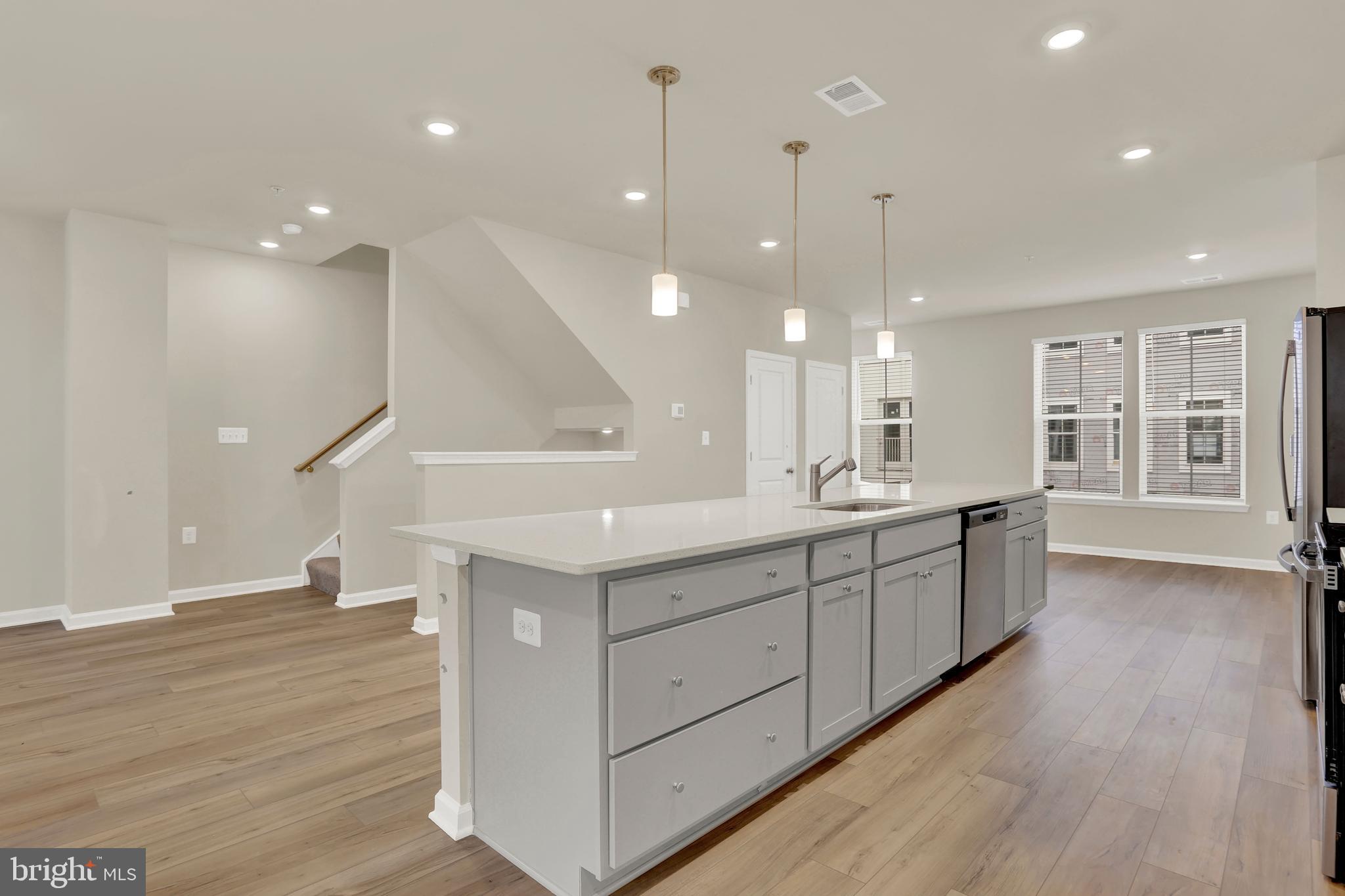 9666 Swallowtail Lane Manassas, VA 20110 - Photo 12 of 92 a large room with lots of counter space and windows