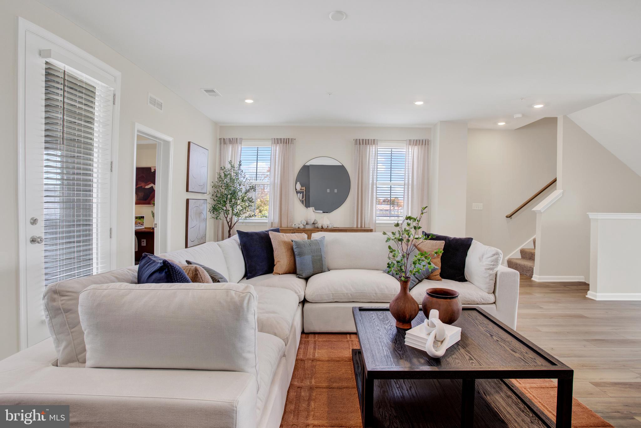 9666 Swallowtail Lane Manassas, VA 20110 - Photo 23 of 92 a living room with furniture and a large window