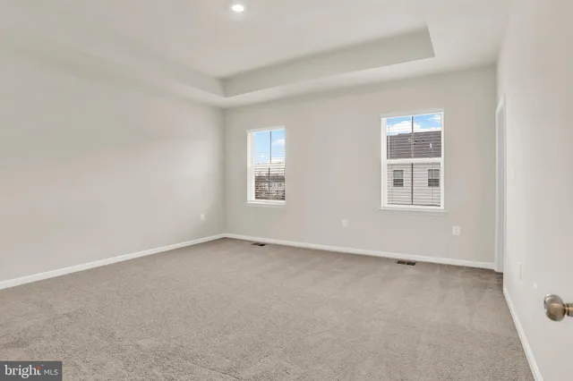a bathroom with a double vanity sink toilet and bathtub