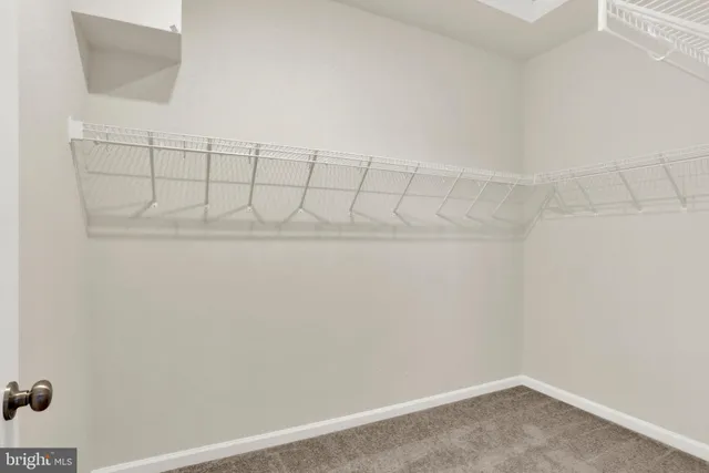 a front view of a building with glass windows