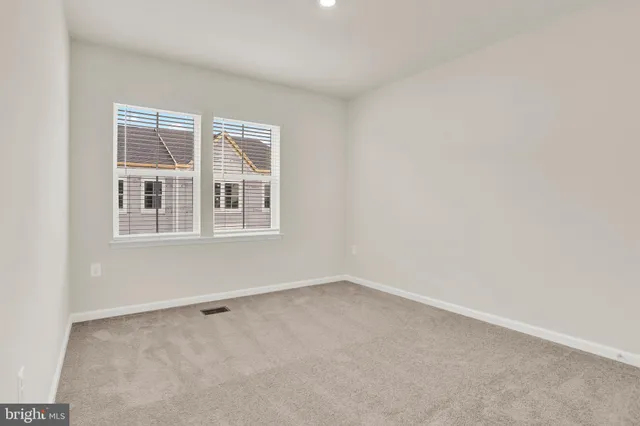 a sign broad on the side of the road