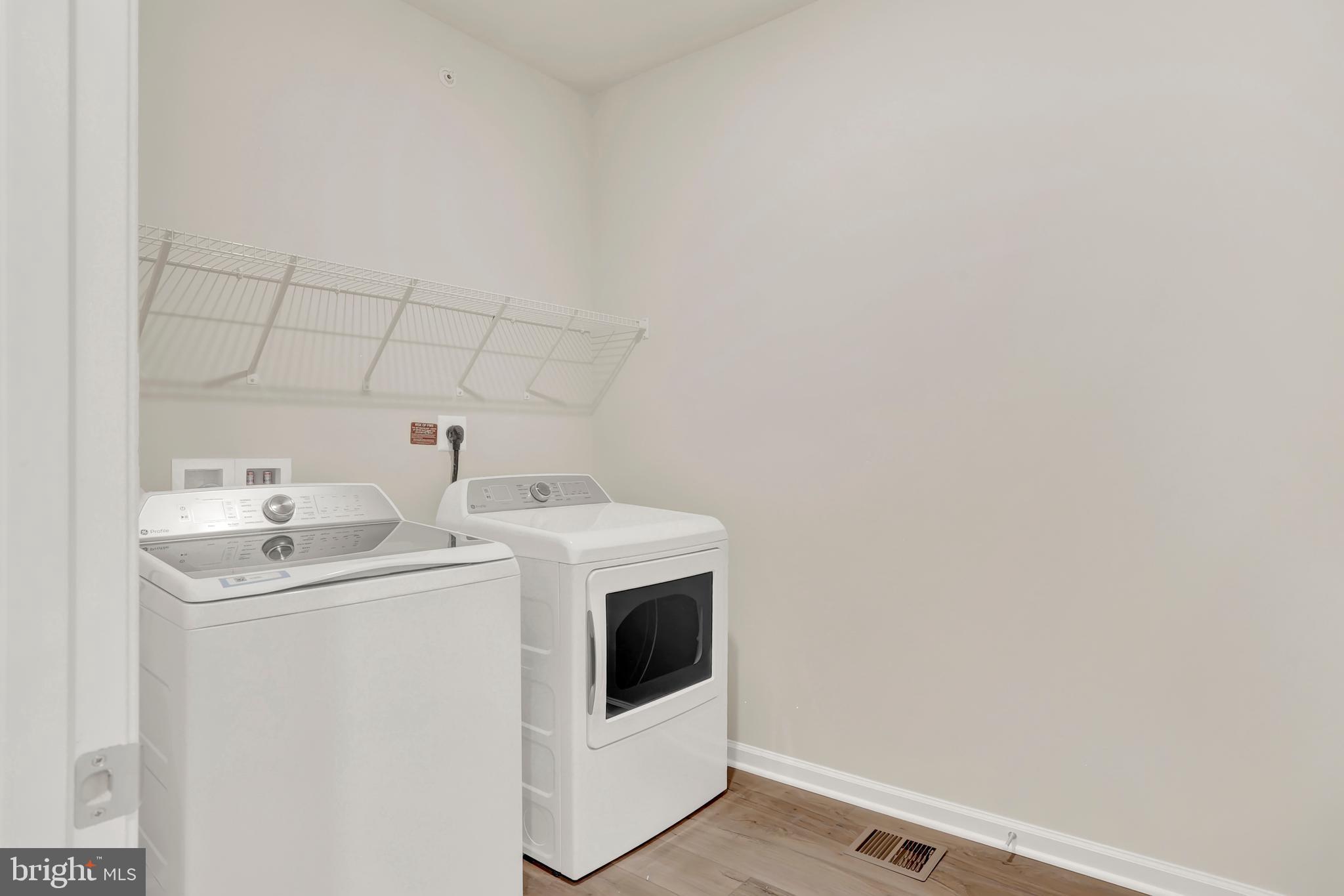 9666 Swallowtail Lane Manassas, VA 20110 - Photo 49 of 92 a utility room with dryer and washer
