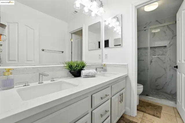 a front view of a house with a yard and outdoor seating