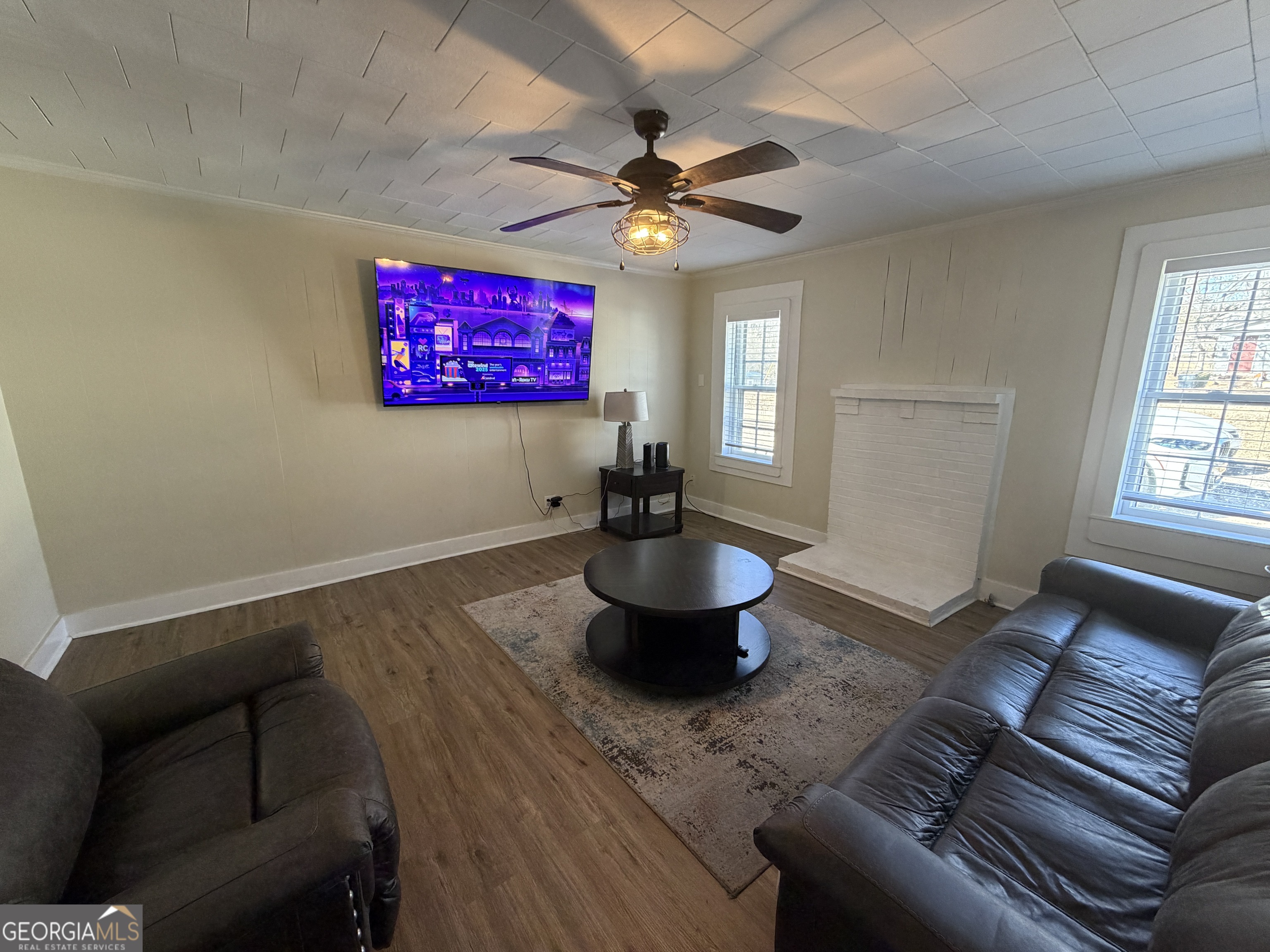 2936 Whitesville Road LaGrange, GA 30240 - Photo 24 of 42 a living room with furniture a window and a chandelier