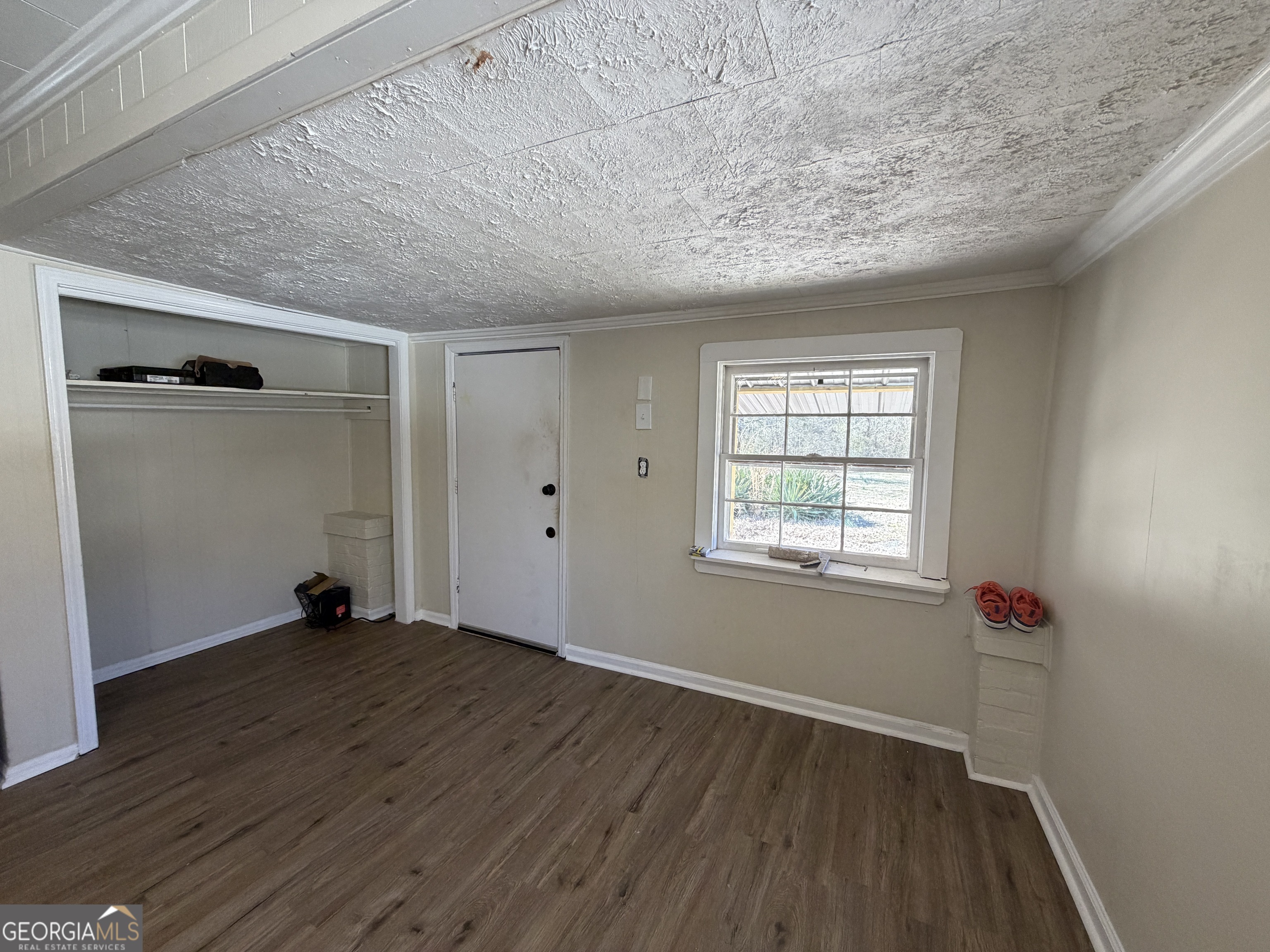 2936 Whitesville Road LaGrange, GA 30240 - Photo 35 of 42 an empty room with wooden floor and windows