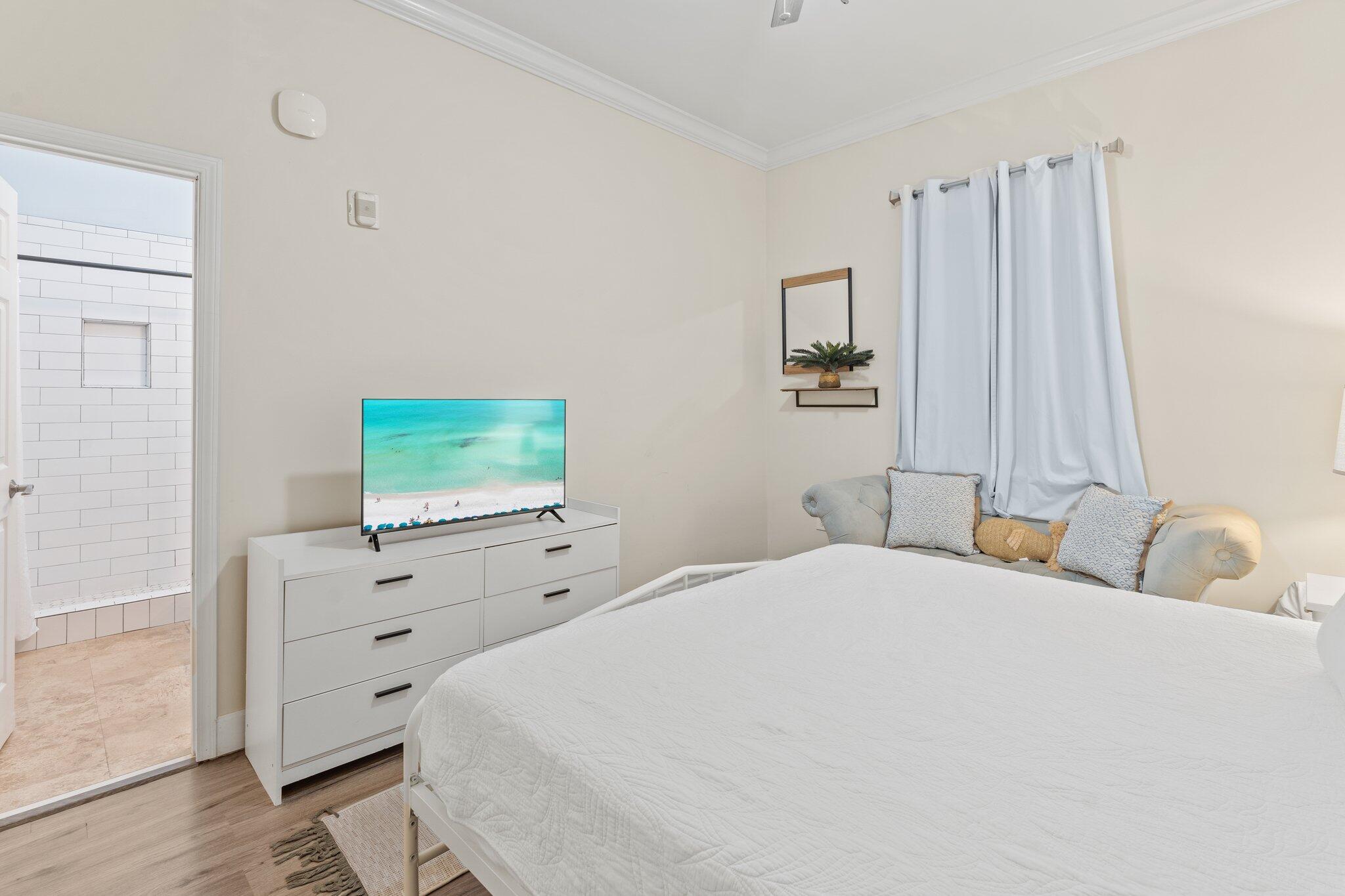 231 Somerset Bridge Road, Unit 1110 Santa Rosa Beach, FL 32459 - Photo 21 of 51 a bedroom with a bed and a dresser