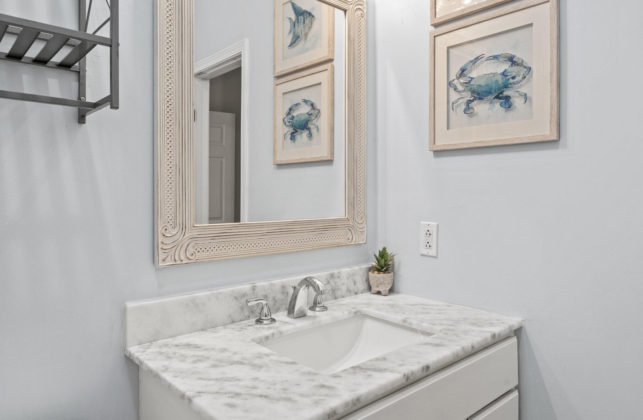 231 Somerset Bridge Road, Unit 1110 Santa Rosa Beach, FL 32459 - Photo 23 of 51 a bathroom with a granite countertop sink and a mirror