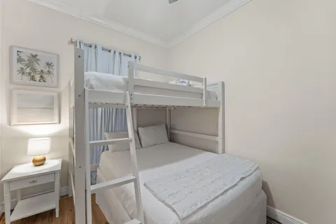 a view of a swimming pool with a lounge chair