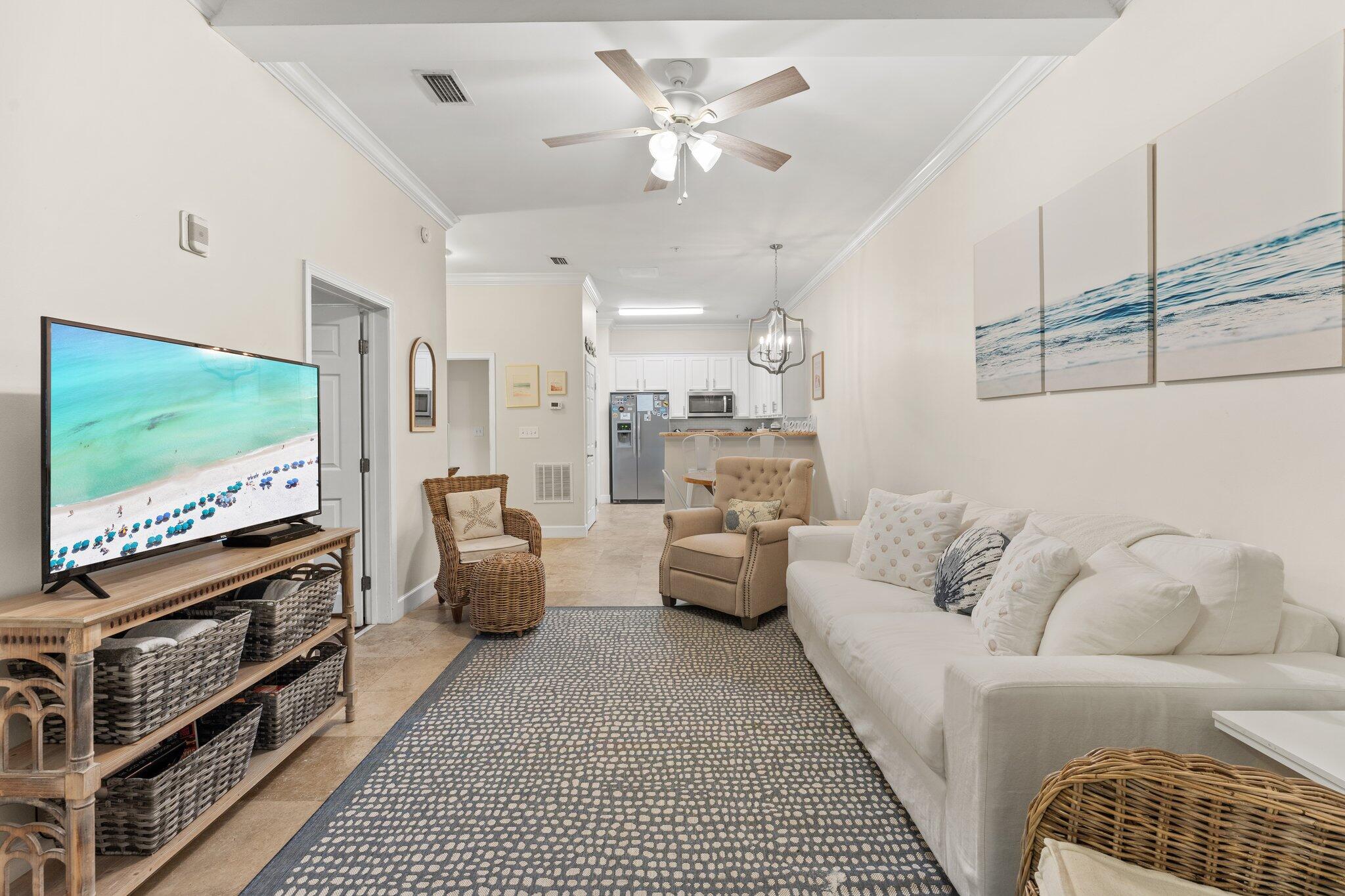 231 Somerset Bridge Road, Unit 1110 Santa Rosa Beach, FL 32459 - Photo 3 of 51 a living room with furniture and a flat screen tv