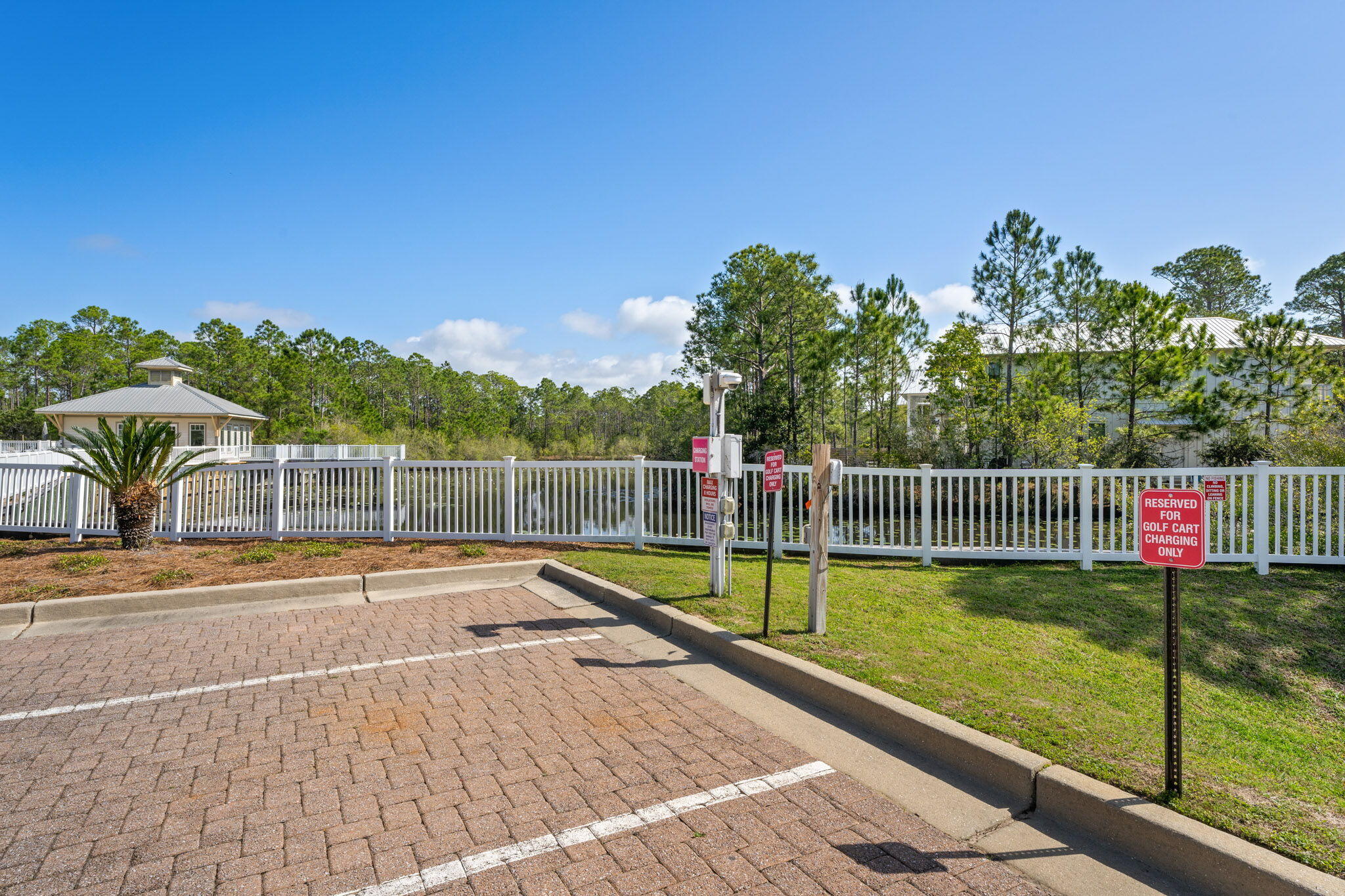 231 Somerset Bridge Road, Unit 1110 Santa Rosa Beach, FL 32459 - Photo 33 of 51 a view of a swimming pool with a yard and plants