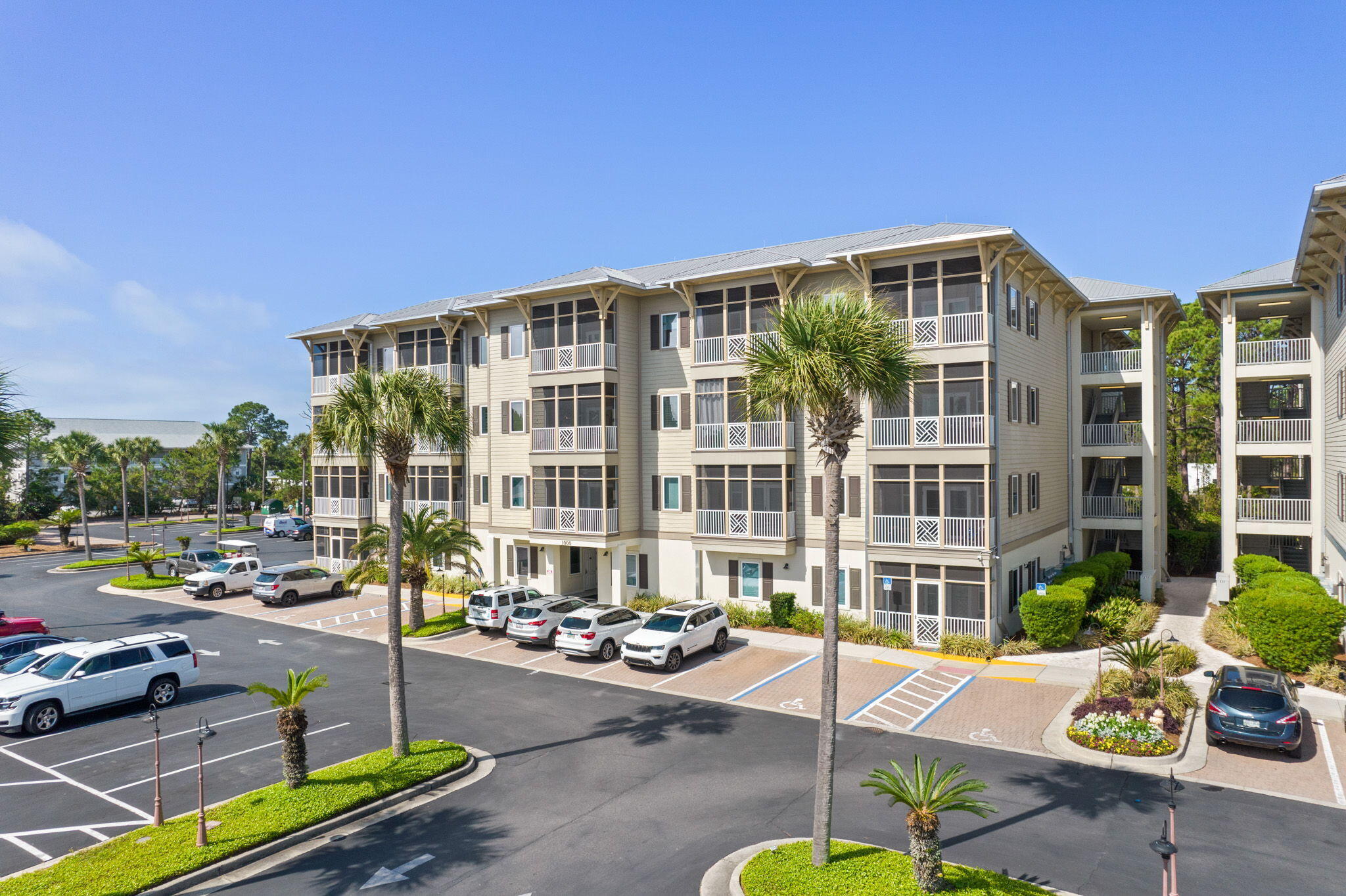 231 Somerset Bridge Road, Unit 1110 Santa Rosa Beach, FL 32459 - Photo 37 of 51 a city view with tall buildings and cars park in front of it