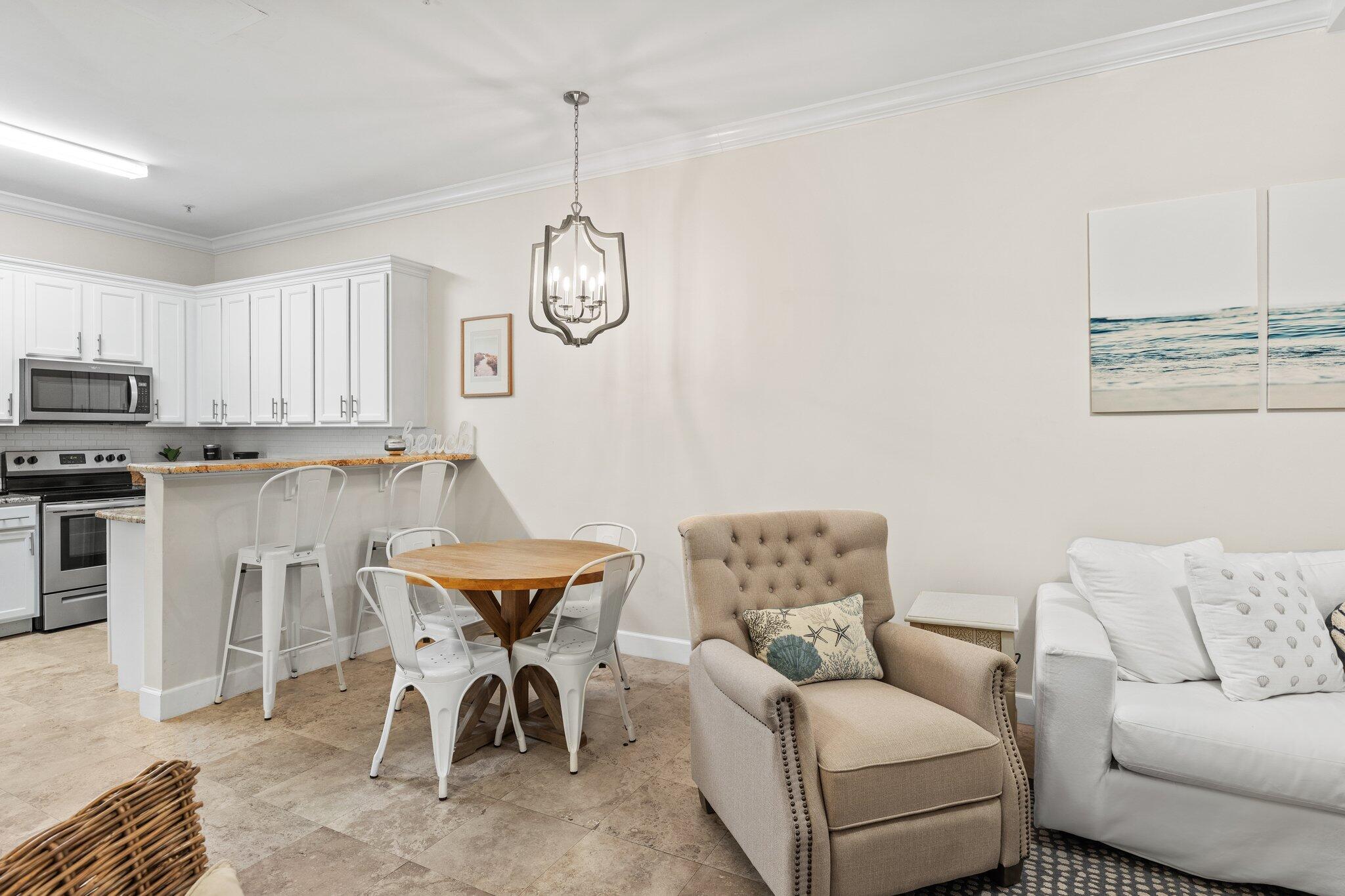 231 Somerset Bridge Road, Unit 1110 Santa Rosa Beach, FL 32459 - Photo 9 of 51 a living room with furniture and kitchen view