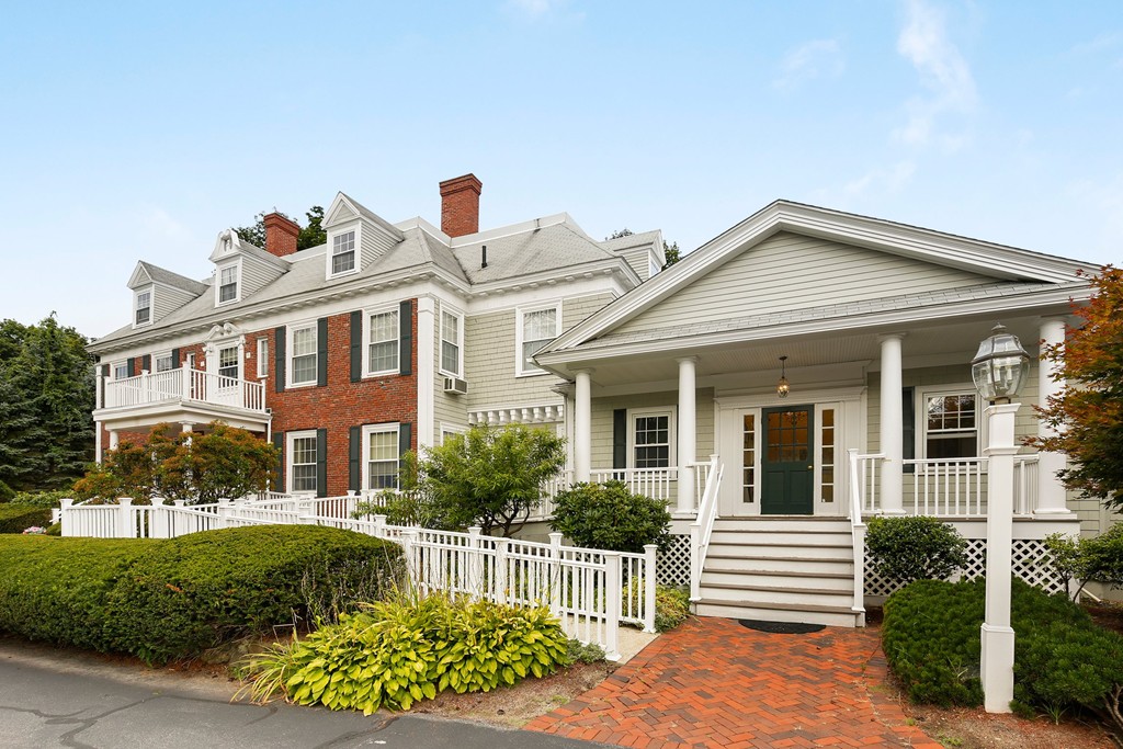 5 Porter Road, Unit A2 Andover, MA 01810 - Photo 2 of 22 front view of a house with a small yard