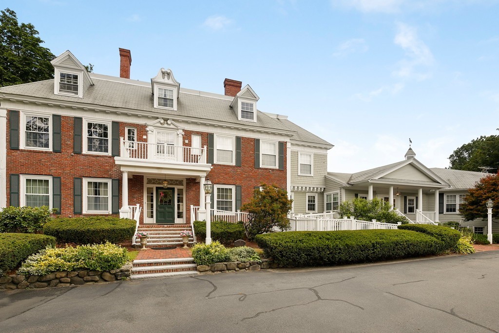 5 Porter Road, Unit A2 Andover, MA 01810 - Photo 22 of 22 a front view of a house with a garden