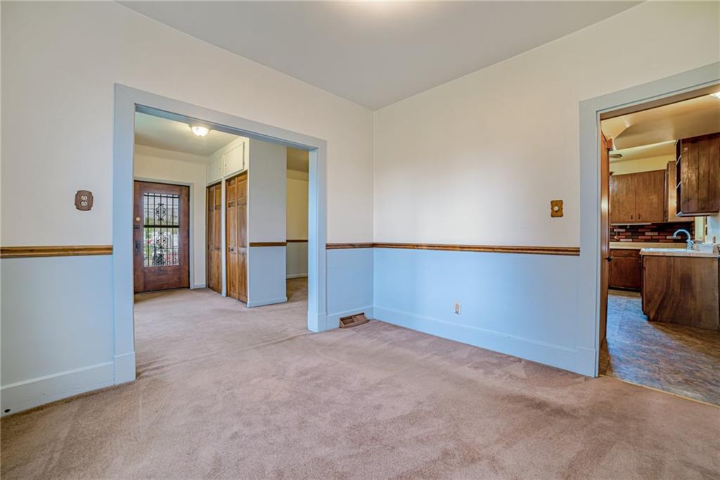 99 Kiskiminetas Drive Apollo, PA 15613 - Photo 12 of 24 an empty room with window and wooden floor