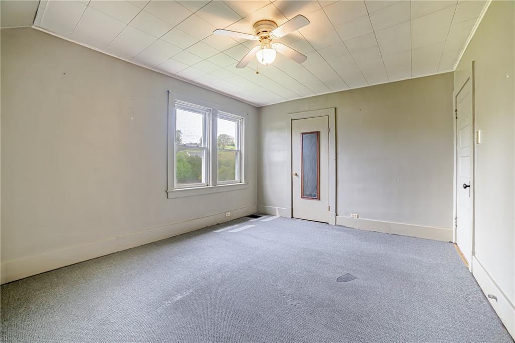99 Kiskiminetas Drive Apollo, PA 15613 - Photo 13 of 24 an empty room with windows and fan