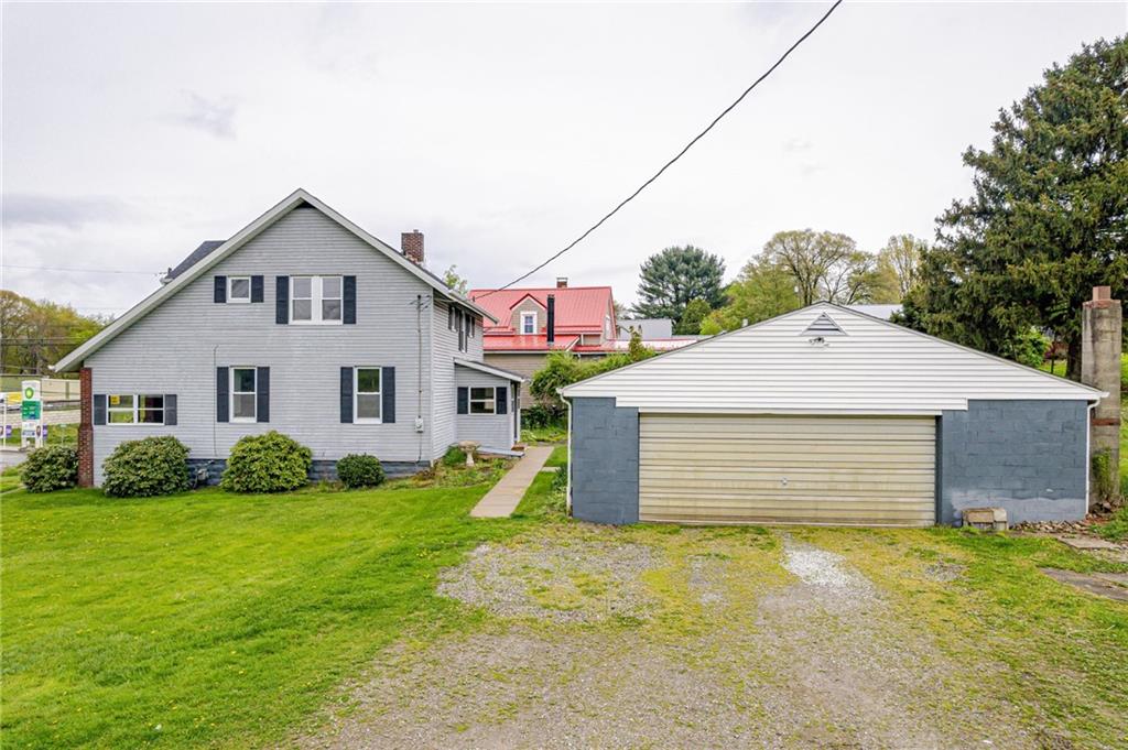 99 Kiskiminetas Drive Apollo, PA 15613 - Photo 2 of 24 a front view of a house with garden