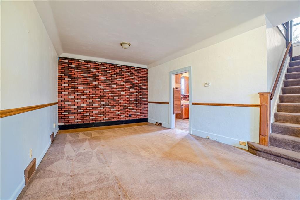 99 Kiskiminetas Drive Apollo, PA 15613 - Photo 7 of 24 a view of an empty room with stairs