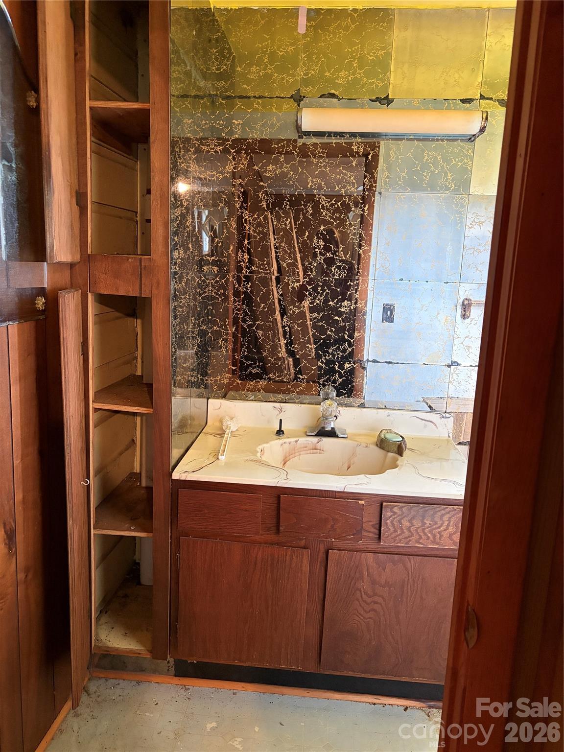 72 Alexander Road Weaverville, NC 28787 - Photo 11 of 17 a bathroom with a sink and a mirror
