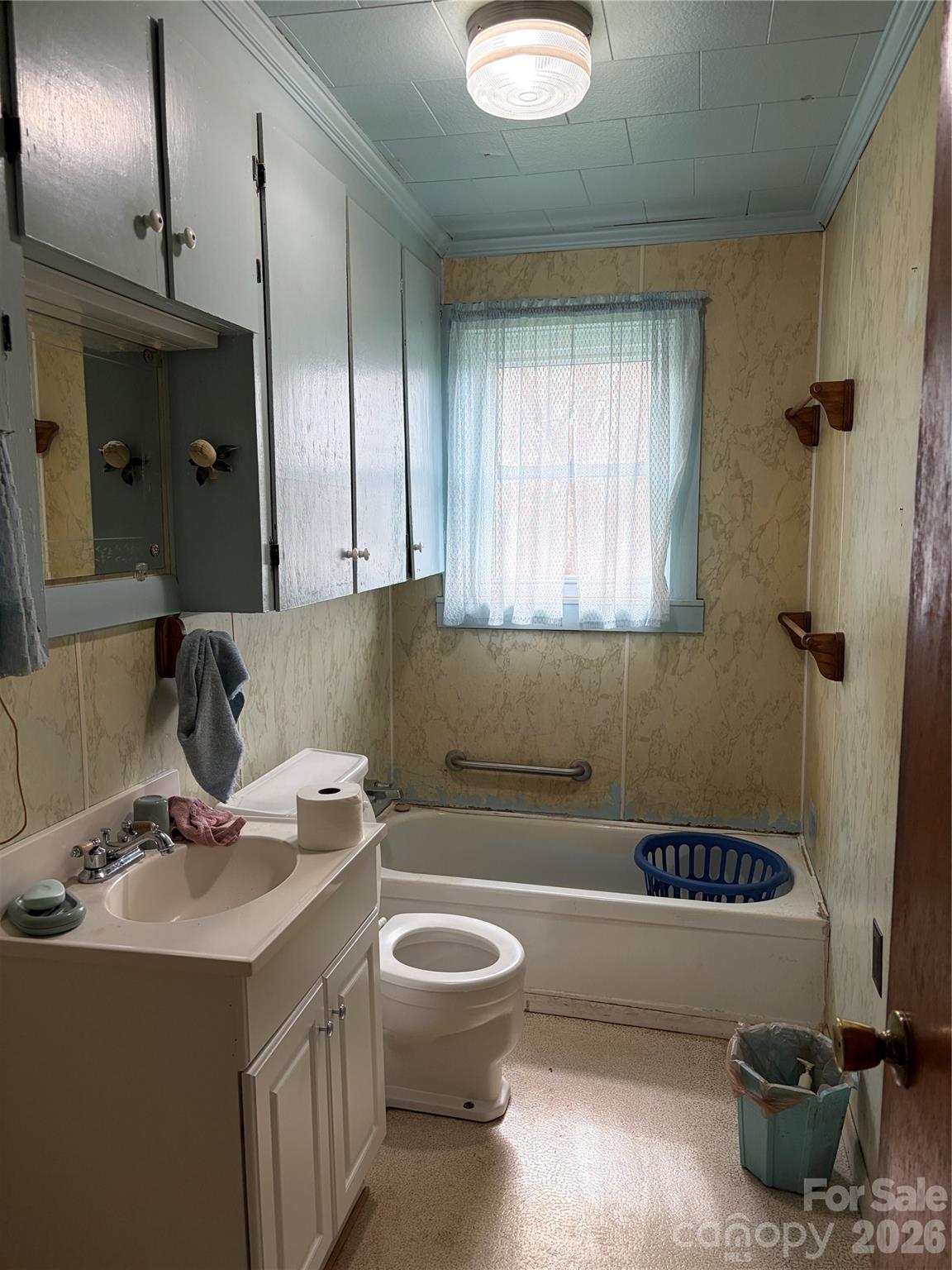 72 Alexander Road Weaverville, NC 28787 - Photo 15 of 17 a bathroom with a sink a toilet and shower