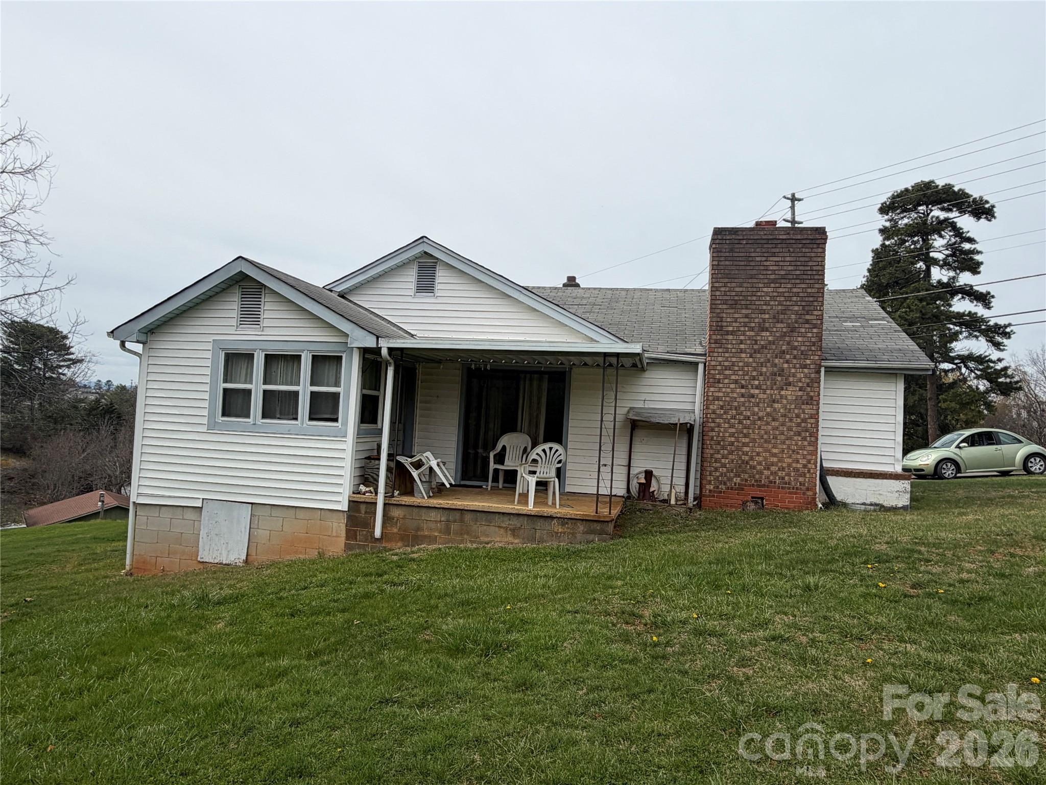 72 Alexander Road Weaverville, NC 28787 - Photo 2 of 17 a front view of a house with patio